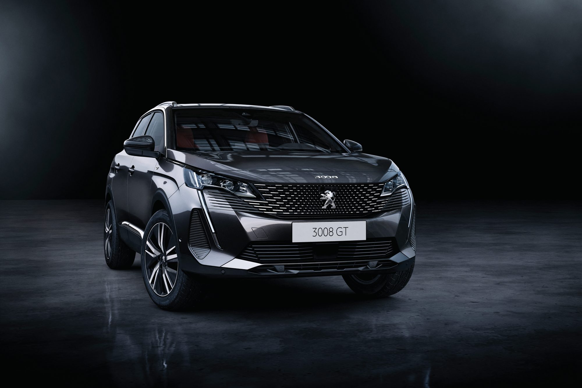 Peugeot 3008 GT, front view on a dark background