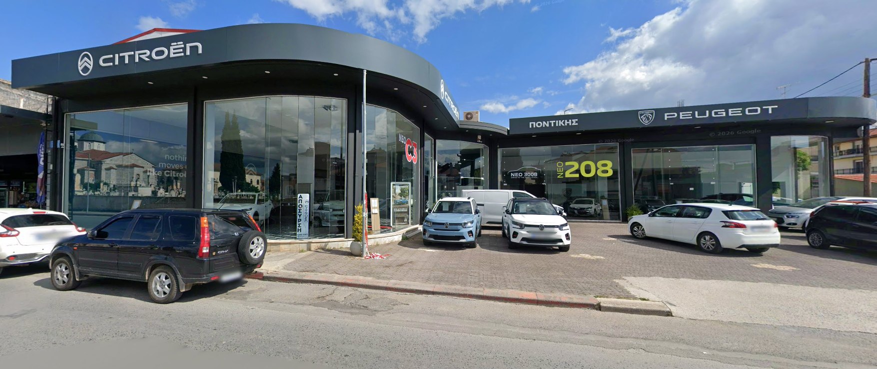 The PONTIKIS showroom in Tripoli, with Citroën and Peugeot signs